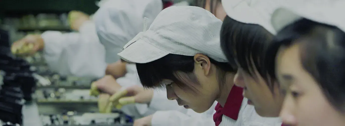 Chinese workers in smartphone factory